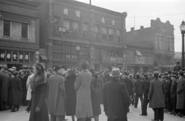 [Onlookers in the Unit Block of East Pender Street for funeral procession]