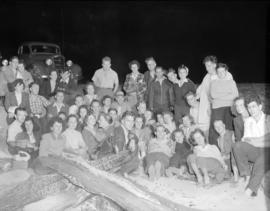 [Group of B.C. Telephone employees at a social event on the beach]