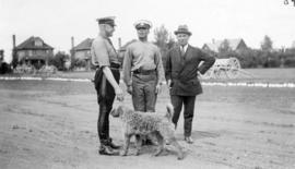 [Three unidentified men during the visit of Douglas Haig, 1st Earl Haig (Field Marshal)]