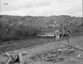 Bulldozer trimming up Bulk Storage excavation