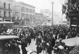 [Armistice day procession on Granville Street at Georgia Street]