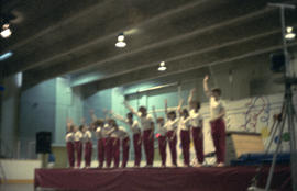 Youth bowing after gymnastics routine