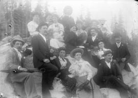 [Men and women assembled for picnic at Barnet Beach]