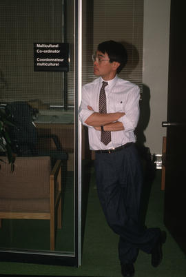 Paul Yee at the door to his office at the Archives of Ontario