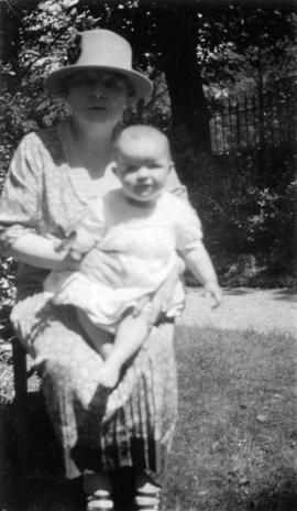 [Octavia Beaton sitting outdoors with Mary Louise Taylor]