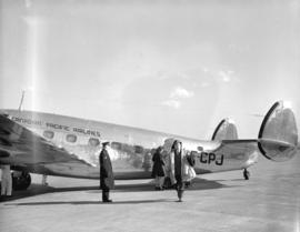 Canadian Pacific Airlines [passengers disembarking]