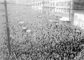 [Crowd on Beatty Street observing Harry Gardiner (the "Human Fly") scale the World Tower]