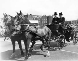 [A horse-drawn carriage in the Diamond Jubilee Parade]