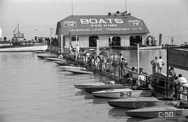 [Speed boats along the Harrison Lake Transport Company boats for hire dock]