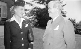 [Lt. Governor W.C. Woodward talking with a stewardess on the occasion of the inaugural Trans Cana...