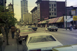 [1000 block Robson Street businesses - Signs for The Old Cheese Shoppe and June Curtis, 2 of 2]