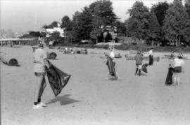 Girl Guides picking up litter from beach