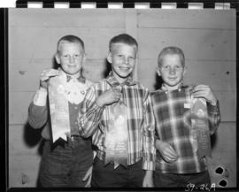 Children holding ribbons from 1959 P.N.E. 4-H Clubs and Future Farmers of Canada Show