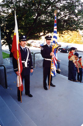 Honour Guard, Vancouver Department Colour Party holding flags on City Hall steps