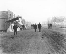[Men walking down] Columbia St., New Westminster [after fire of] Sept. 1898
