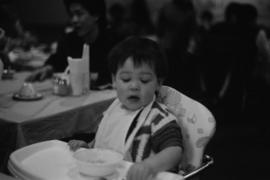 Boy in high chair