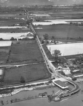 [Northern view of ferry dock and vehicles waiting to cross the Fraser River]