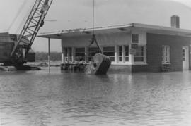 Crane, building and flood waters