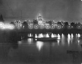 [View of the Parliament Buildings alight at night]