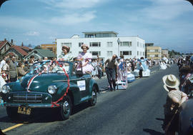 Parade, on Cornwall Street, car and children in floats and spectators