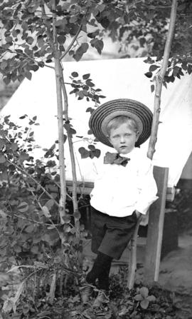 [Charles Bailey, son of photographer Charles S. Bailey, as a young child, wearing a straw hat]