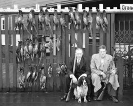Bob Brown and Don McKenzie with bag of pheasants [and ducks]