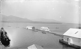 [Swimming baths and boat rental floats in Burrard Inlet at the foot of Bute Street]