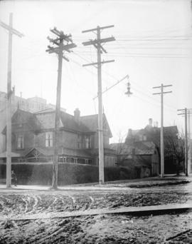 [Newly installed power poles at the southeast corner of Hastings and Burrard Streets]