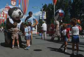 Tillicum greeting children at P.N.E. grounds