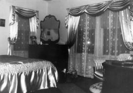 Curtains and dresser in bedroom at 1796 West 15th Avenue