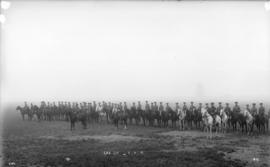 [Group photo of V.V.R. Cavalry Division on horseback]