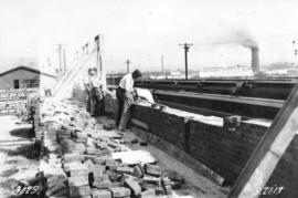 [Construction progress photograph of the CPR S.D. & P.C. Dept. Storage warehouse]