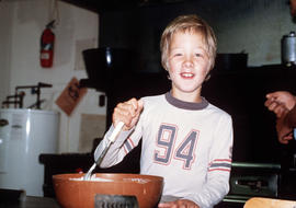Boy with mixing bowl