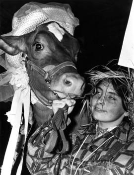Susan White : [4-H club member and cattle in costume]