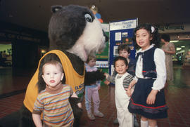 Tillicum interacting with children at Lougheed Mall
