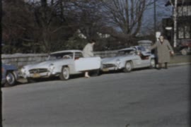 Mr. and Mrs. Bentley driving cars in Shaughnessy