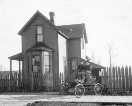 [William Fenton and his mother in a "locomobile" in front of 602 Grove Avenue (Atlantic...