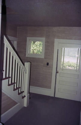 [View of staircase and doorway]