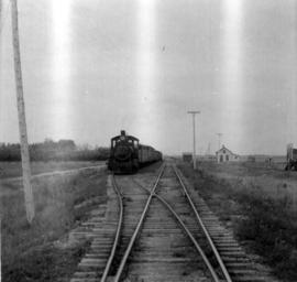 [Waiting for the arrival of the Glidden automobile on the Soo Line]