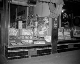 [Saturday Evening Post and Pacific Great Eastern Railyway window display at Cunningham's]