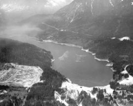 [Aerial view of the Cleveland Dam, Capilano Lake and a portion of the Glenmore subdivision]