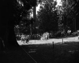 [Children lined up for pony rides on Bowen Island]