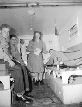 Canadian Red Cross [with returning soldiers at] Great Northern Station