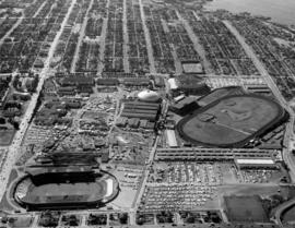 Aerial view of area surrounding Pacific Coliseum construction looking east