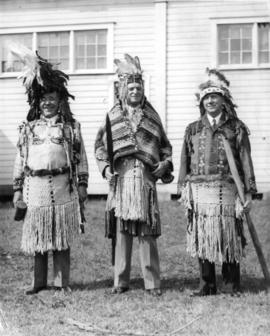 W. Leek and unidentified men wearing First Nations clothing