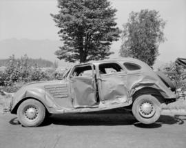 Auto Metal & Radiator Co. - Damaged Chrysler at Vancouver Towing