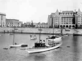 Empress Hotel, New Union Club on left and Inner Harbour with boats in foreground