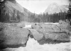 Natural bridge on Kicking Horse River and Mt. Stephen. C.P.R. Field