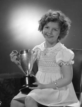 Caroline Lawrence with Captain Fletcher Challenge trophy