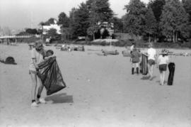 Girl Guides picking up litter from beach